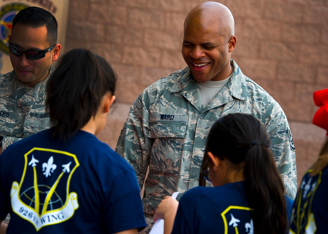 Operation HERO allowed nearly 100 children of 926th Wing reservists to participate in a simulated deployment line to learn what it is like for their parents to deploy. The event featured a mission briefing, candy from each station and an obstacle course.