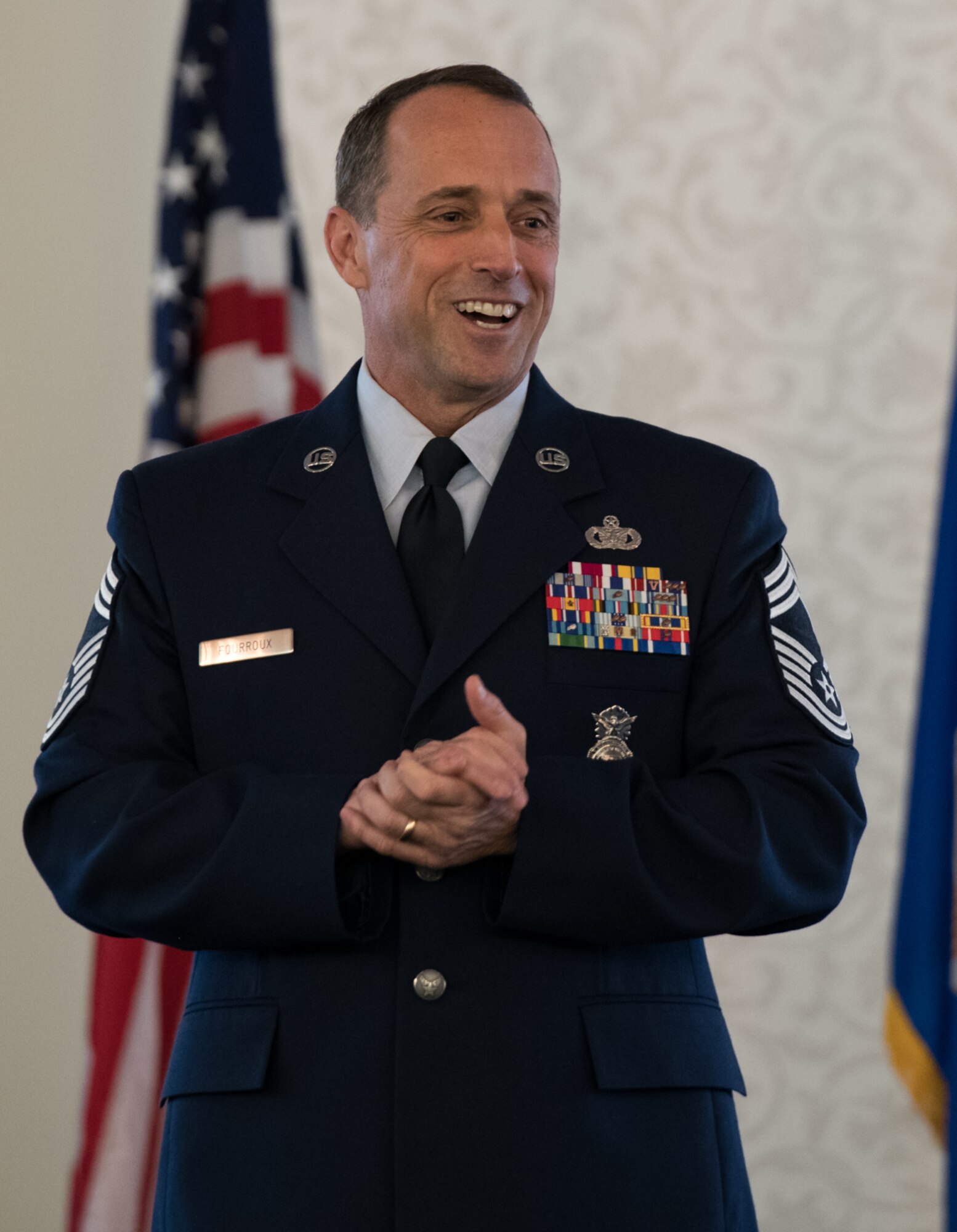 U.S. Air Force Reserve Chief Master Sgt. Karl Fourroux, security forces manager, 932nd Airlift Wing, addresses the audience at his retirement ceremony on April 6, 2019, Scott Air Force Base, Illinois. Fourroux retired after honorably serving for 34 years.  (U.S. Air Force photo by Senior Airman Brooke Deiters)