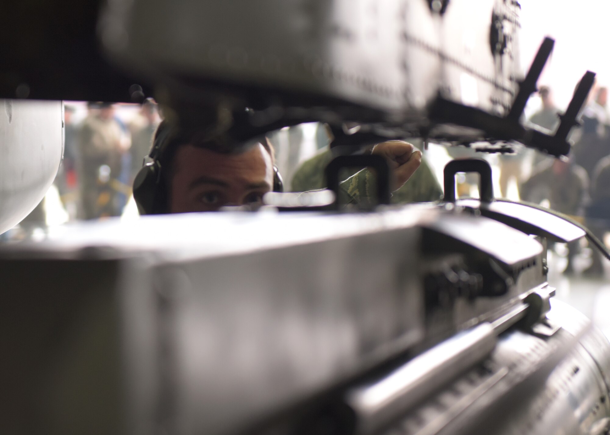 U.S. Air Force Staff Sgt. Peter Discipio, a weapons load crew team chief assigned to the 51st Aircraft Maintenance Squadron, prepares to mount a munition onto an A-10 Thunderbolt II during a weapons load crew competition at Osan Air Base, Republic of Korea, April 5, 2019. Weapons load crew competitions test a squadron’s ability to safely and accurately load munitions onto their respective aircraft. (U.S. Air Force Photo by Staff Sgt. Timothy Dischinat)