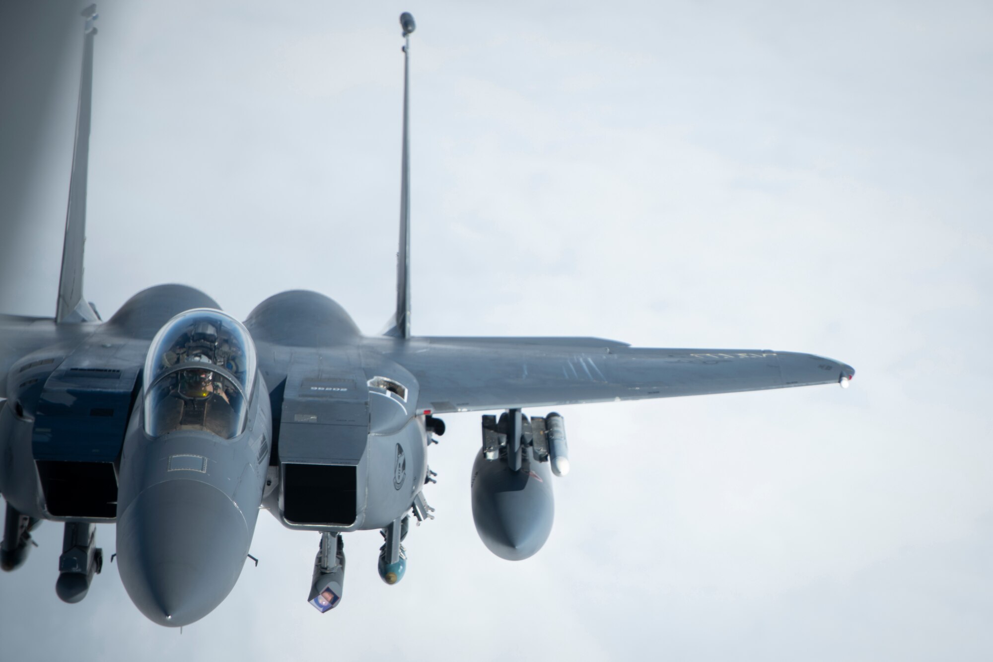 A U.S. Air Force F-15E Strike Eagle assigned to the 492nd Fighter Squadron at RAF Lakenheath, England, approaches a KC-135 Stratotanker from the 100th Air Refueling Wing, RAF Mildenhall, England, to receive fuel over Scotland during exercise Joint Warrior 19-1, April 4, 2019. Exercise Joint Warrior is a biannual, U.K.-led multinational exercise and one of largest NATO exercises in Europe, involving 13 countries.  (U.S. Air Force photo by Tech. Sgt. Emerson Nuñez)