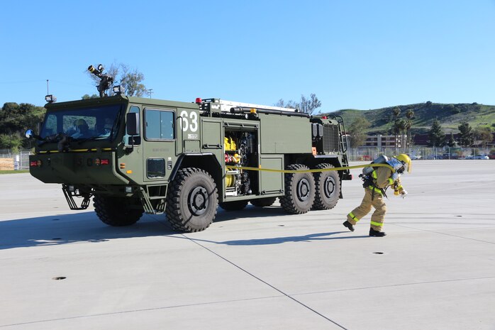 Aircraft Rescue and Fire Fighting Marines use a P-19R to respond to an incident during an exercise aboard Marine Corps Air Station Camp Pendleton, Calif, in February 2019. Program Executive Officer Land Systems is currently fielding the P-19R to Marines worldwide. (U.S. Marine Corps photo by Ashley Calingo)