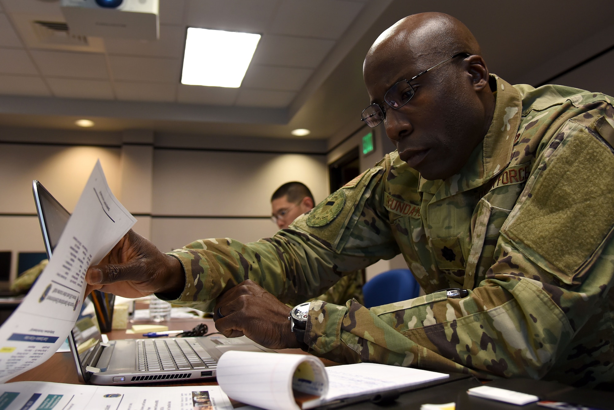 U.S. Air Force Lt. Col. Ola Ekundayo, mission assurance branch chief assigned to the Joint Staff, develops lesson plan content at the U.S. Air Force Expeditionary Operations School (EOS), part of the U.S. Air Force Expeditionary Center, at Joint Base McGuire-Dix-Lakehurst, New Jersey, April 3, 2019.