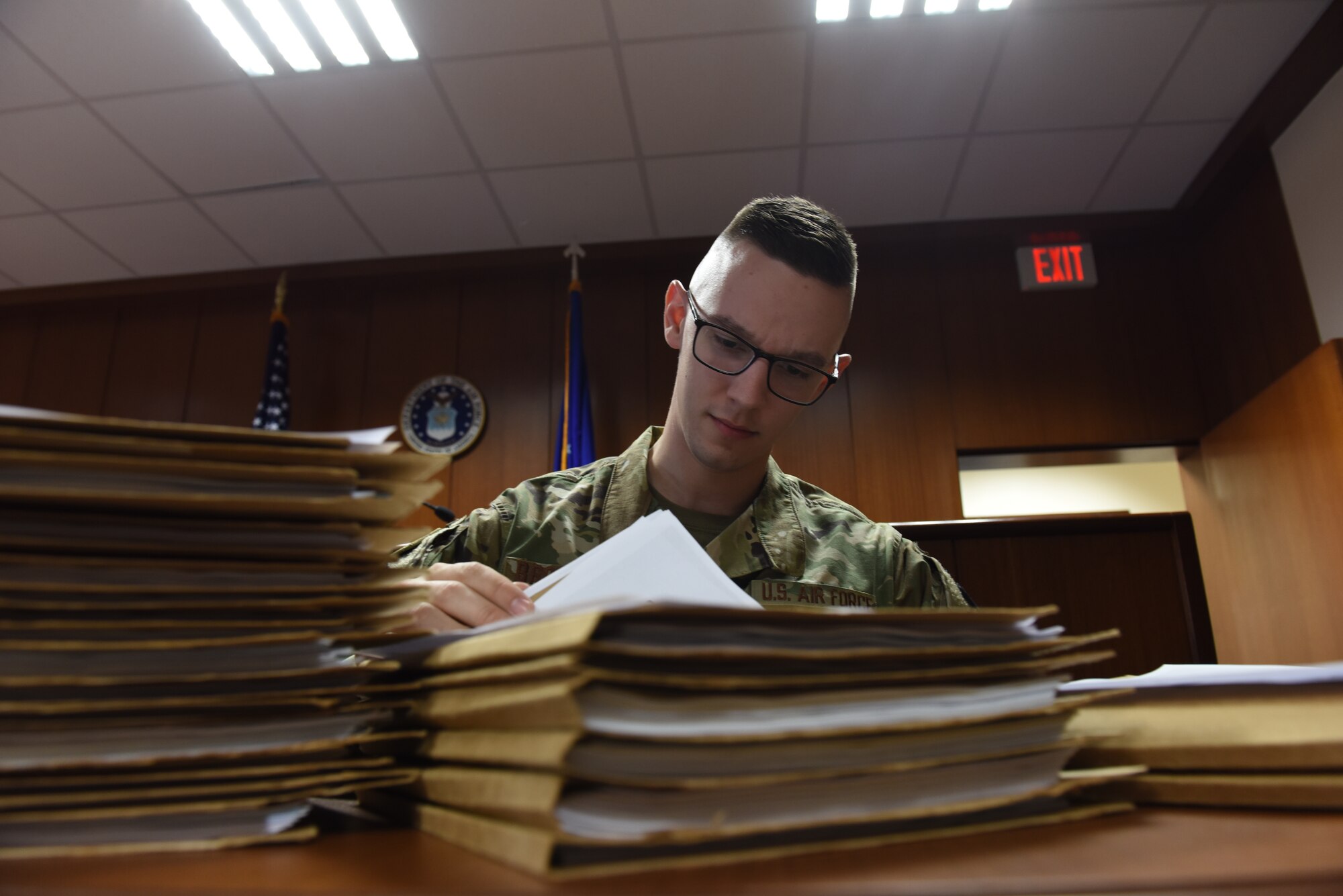 Senior Airman Mark Brownlee, 39th Air Base Wing military justice paralegal, reviews legal documents prior to a Judge Advocate Inspection March 11, 2019, at Incirlik Air Base, Turkey.