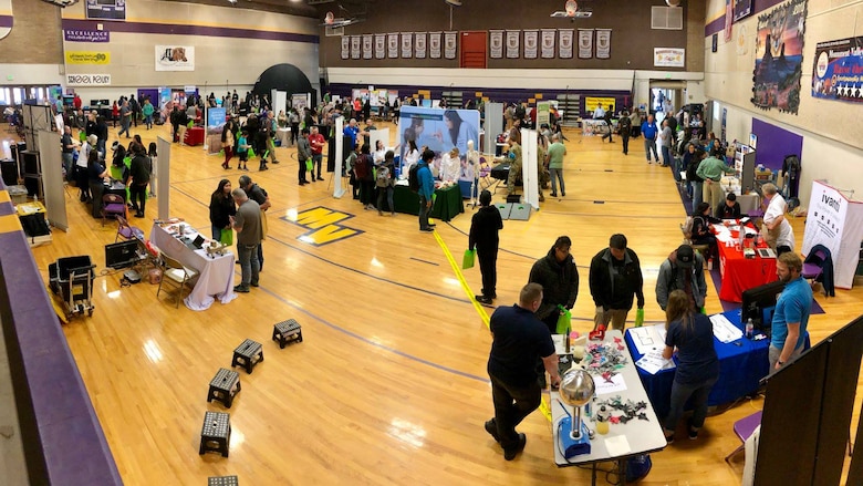 Students at Monument Valley High School in Kayenta, Utah, participate in the San Juan Career Fair March 27, 2019. Hill AFB computer scientists and engineers presented the electricity demonstration, taught some basic coding skills and encouraged students to focus on STEM-related subjects, giving them an idea of the important work they could do if they chose an Air Force career. (Courtesy photo)