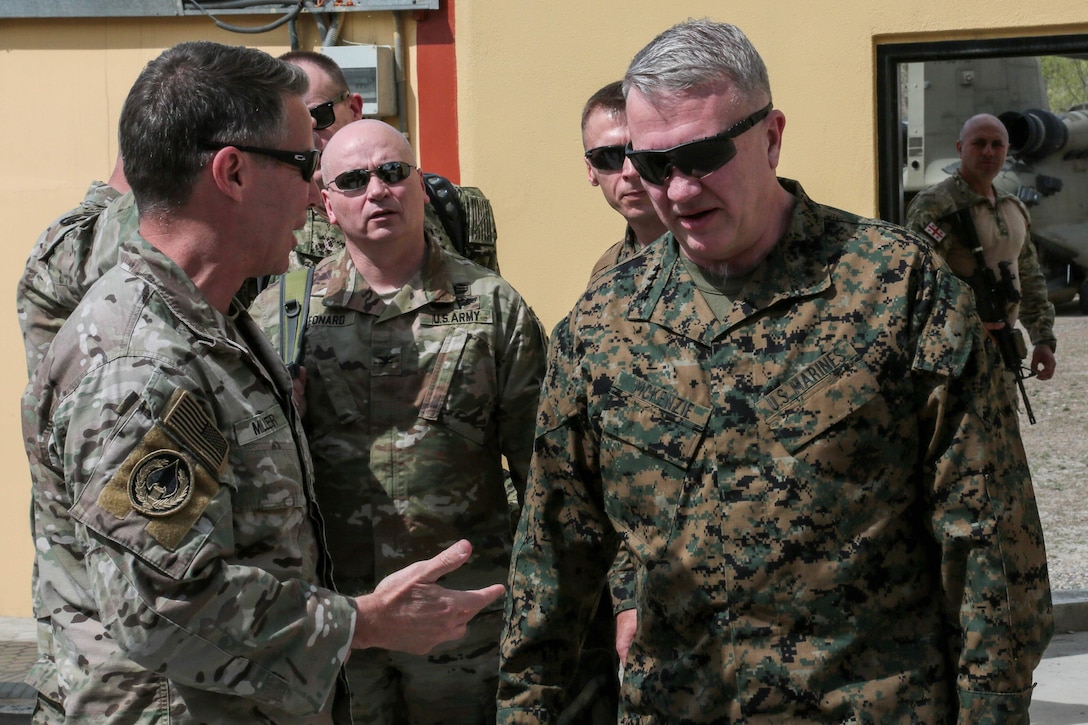 U.S. Marine Corps Gen. Kenneth F. McKenzie Jr., U.S. Central Command commander, right, meets with U.S. Army Gen. Austin Scott Miller, Resolute Support Mission commander, left, during his visit to Kabul Afghanistan, April, 5 2019. During the meeting, McKenzie and Miller discussed security and stability in the region. (U.S. Central Command photo by Sgt. Franklin Moore)