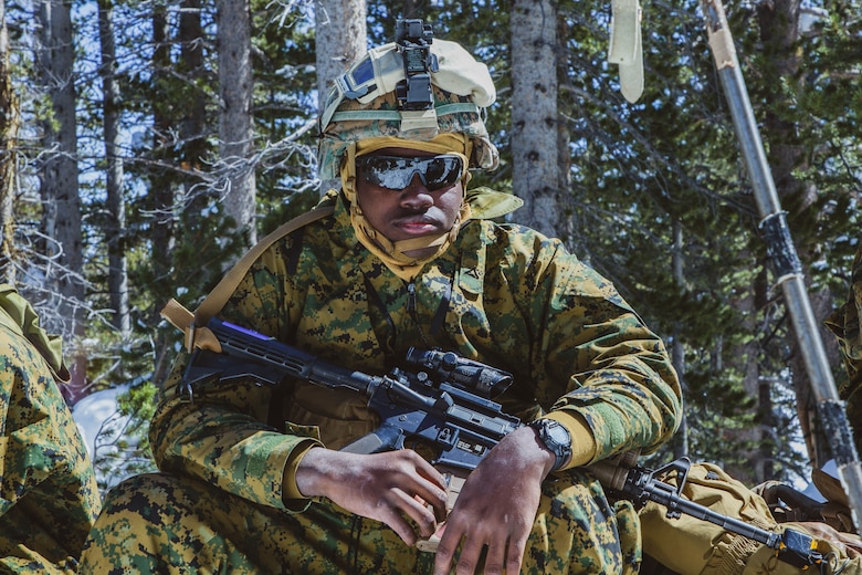 A U.S Marine with Company G, 1st Battalion, 6th Marine Regiment, 2nd Marine Division, poses for a photo before a hike, during Mountain Training Exercise 2-19, at Marine Corps Mountain Warfare Training Center, Bridgeport, Calif., March 24, 2019.  The purpose of MTX is to prepare Marines for harsh weather conditions while enhancing winter warfare skills in cold weather environments.