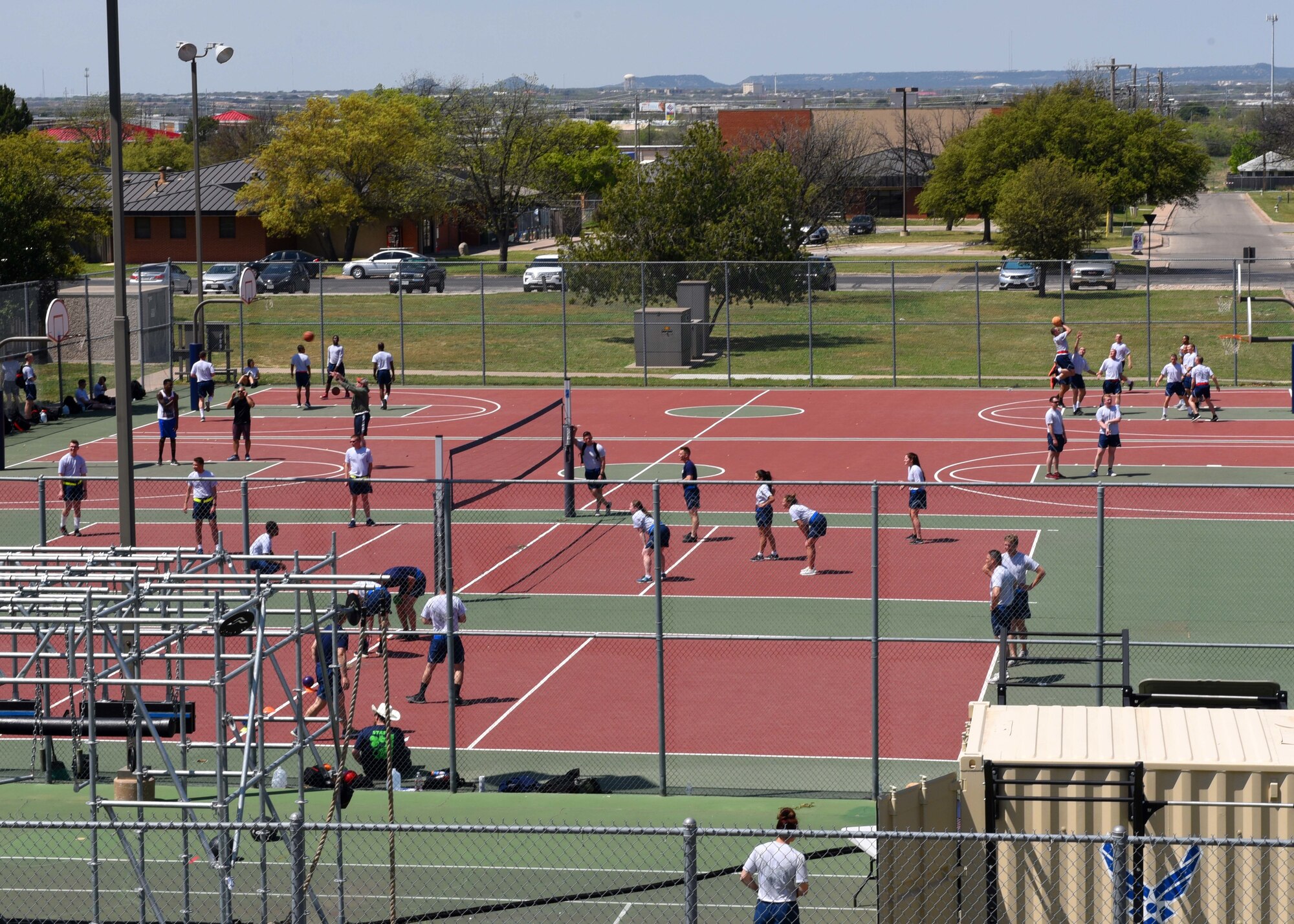 Members from the different squadrons join in activities during Sports Day at the Mathis Fitness Center, Goodfellow Air Force Base, Texas, April 5, 2019. Sports Day was an all-day activity that allowed students and permanent party a chance to come out and relax while demonstrating some healthy rivalry. (U.S. Air Force photo by Airman 1st Class Zachary Chapman/Released)