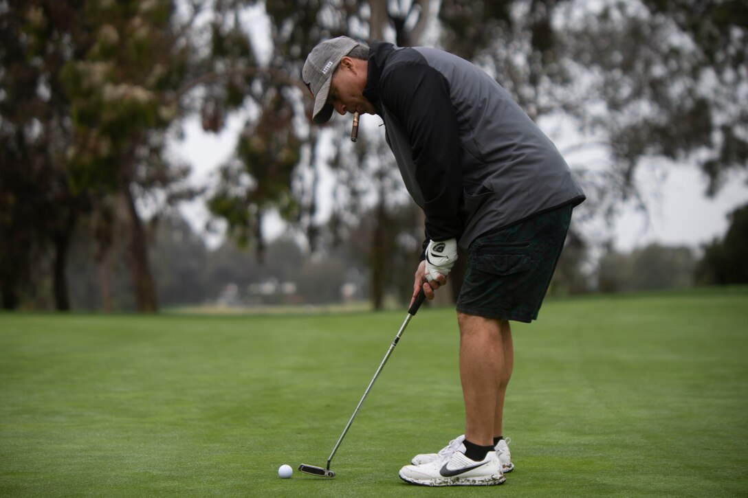 Lt. Ray Valentin with the San Diego Police Department (SDPD,) tees off during the golfing community event with SDPD Northeastern Division and Marines with Marine Corps Air Station Miramar, Calif., April 5. The 2019 golf tournament was hosted in honor of America’s first responders. The event consisted mostly of active duty military members, veterans, firefighters and the San Diego Police Department. (U.S. Marine Corps Photo by LCpl. Cheng Chang)