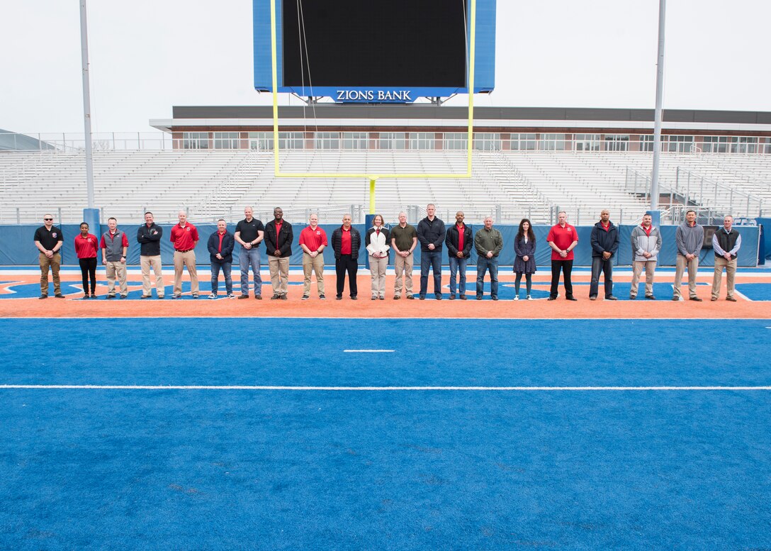 Chiefs from Mountain Home Air Force Base take a group photo on the Boise State University football field during the the professional development seminar March 22, 2019, at BSU. The seminar was held to educate chiefs on cross-generation communication effectiveness. (U.S. Air Force photo by Senior Airman Tyrell Hall)
