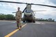 U.S. Army Capt. Jennifer West, 1-228th Aviation Regiment Bravo Company commander, stands by a CH-47 Chinook at Soto Cano Air Base, Honduras, April 4, 2019.