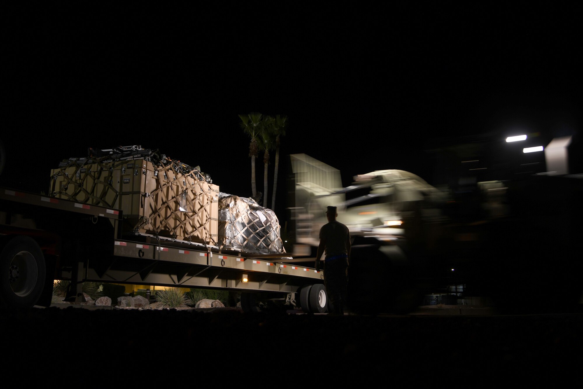 U.S. Air Force Airmen from the 355th Logistics Readiness Squadron load aircraft pallets at Davis-Monthan Air Force Base, Ariz., April 2nd 2019.