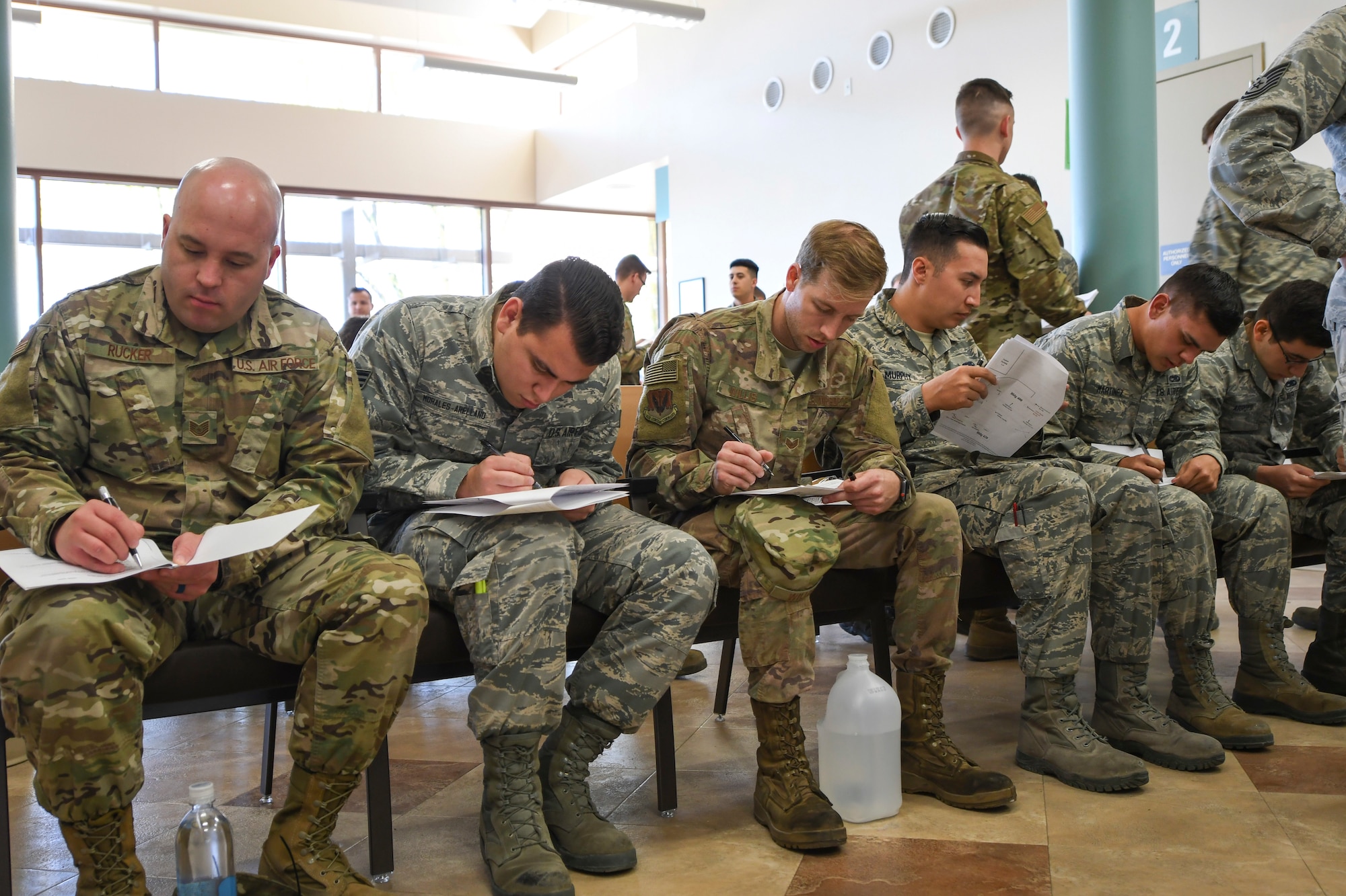 U.S. Airmen prepare medical paperwork to ensure they are medically fit-to-fight during exercise Bushwhacker 19-05 at Davis-Monthan Air Force Base, Ariz., April 3, 2019.