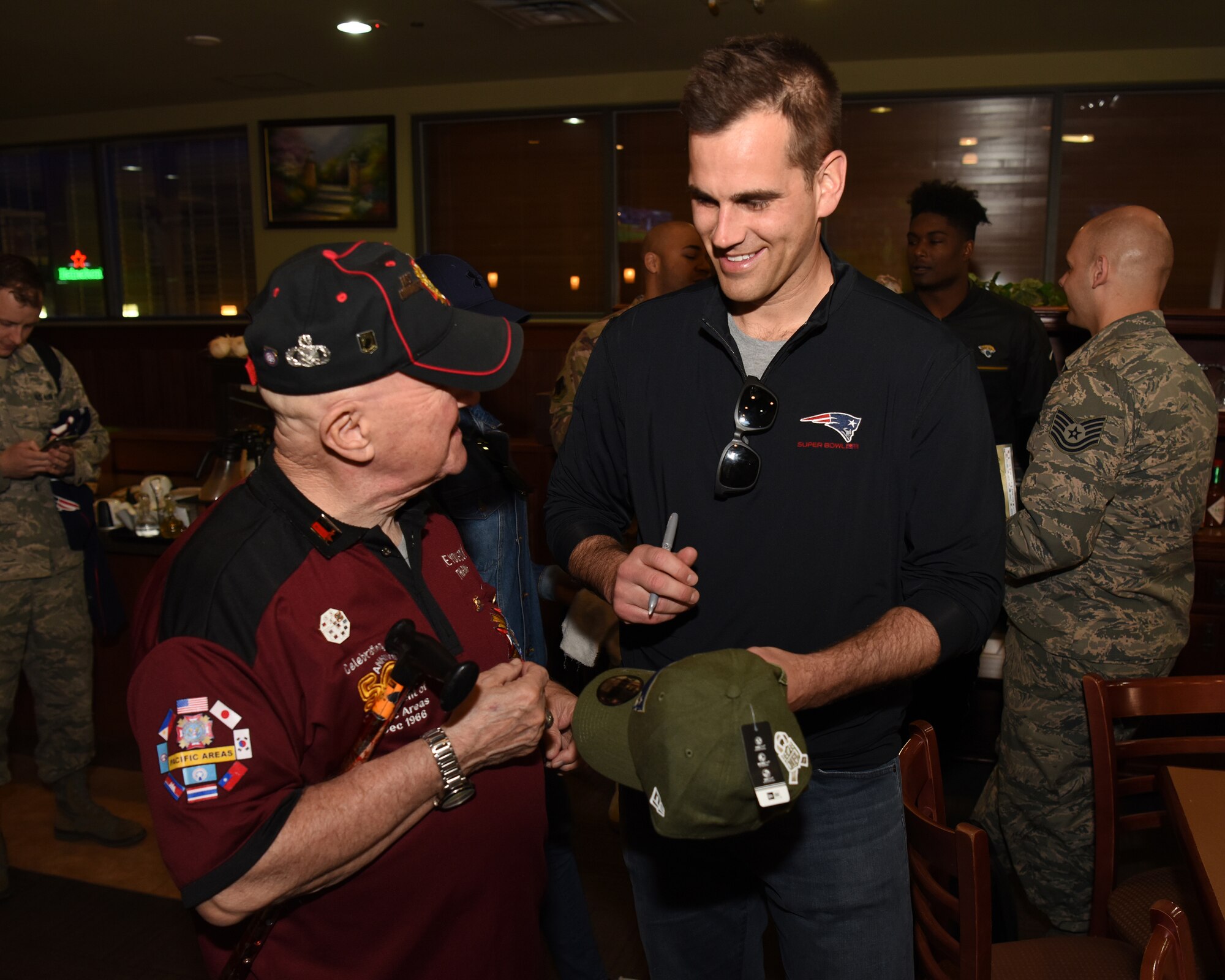 NFL players score Osan visit