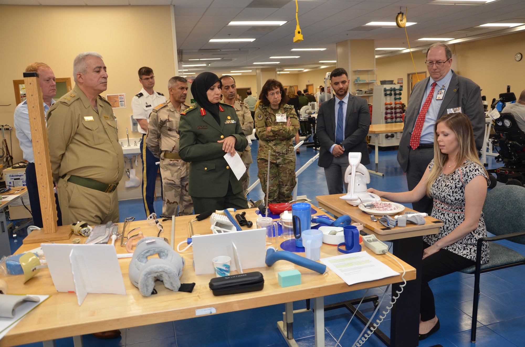 Military medical officials representing eighteen coalition and partner nations view a prosthetic component display during a tour of the James A. Haley Veteran’s Hospital during USCENTCOM’s Medical Security Cooperation Exchange, April 4, 2019. The biennial event provides a forum to exchange information intended to enhance medical capabilities in support of missions that include disaster response, humanitarian assistance, and combat and peacekeeping operations. (Courtesy Photo by Ed Drohan)