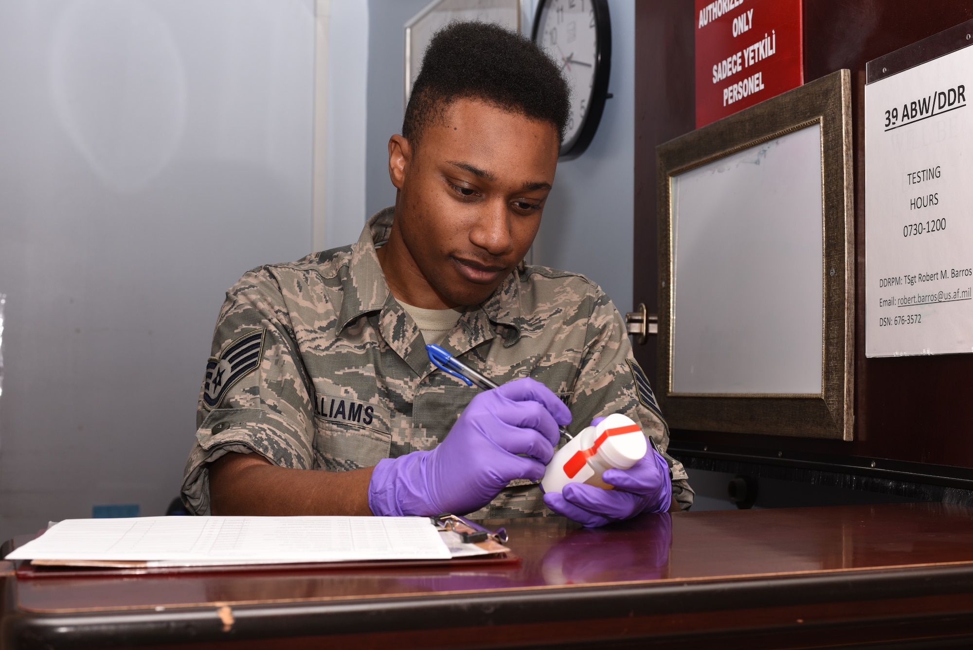 Staff Sgt. Tyler Williams, 39th Air Base Wing drug program administrative manager, documents a sample for the Drug Demand Reduction Program March 14, 2019, at Incirlik Air Base, Turkey.