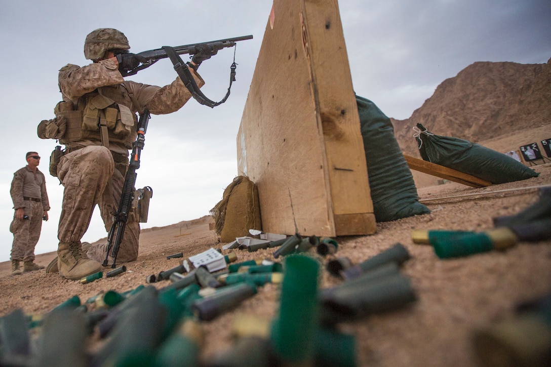 A U.S. Marine with 5th Platoon, Charlie Company, Fleet Anti-Terrorism Security Team, Central Command, fires the M500 shotgun during range operations and a subject matter expert exchange with service members from 77th Marine Battalion, Royal Jordanian Naval Force. FASTCENT provides expeditionary antiterrorism and security forces to embassies, consulates and other vital national assets throughout the region.
