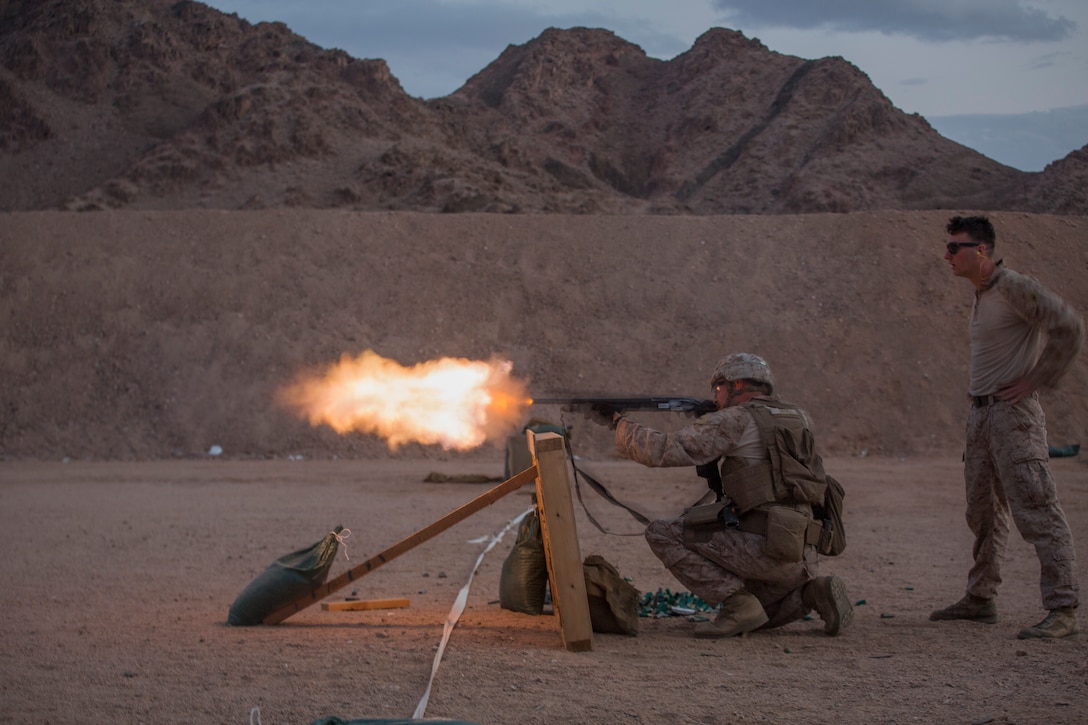 U.S. Marine Lance Cpl. David T. Shook, a designated marksman with 5th Platoon, Charlie Company, Fleet Anti-Terrorism Security Team, Central Command, fires the M500 shotgun during range operations and a Subject matter expert exchange with service members from 77th Marine Battalion, Royal Jordanian Naval Force. FASTCENT provides expeditionary antiterrorism and security forces to embassies, consulates and other vital national assets throughout the region.