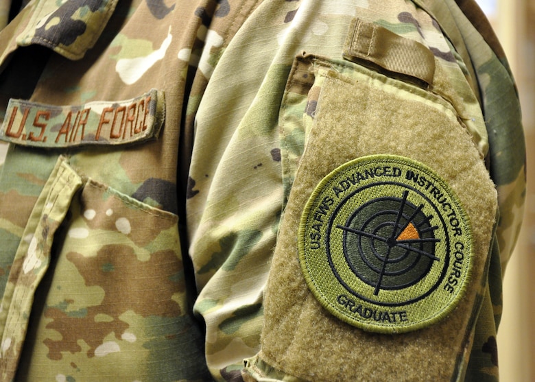 The 455th Air Expeditionary Wing intelligence flight chief is the first enlisted weapons school graduate to wear the new patch in Afghanistan. The patch was approved in October 2018. (U.S. Air Force photo by Capt. Anna-Marie Wyant)
