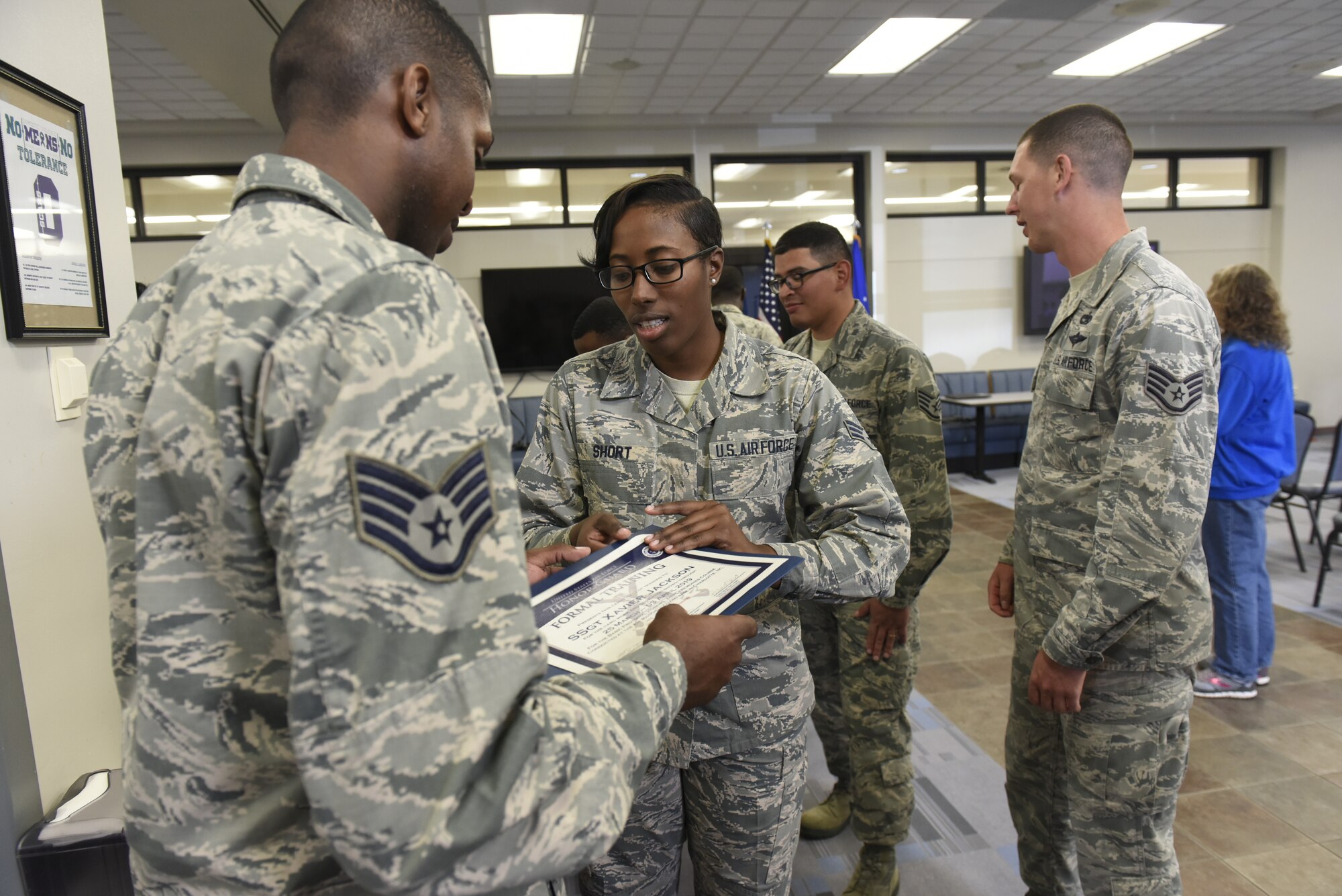Airmen from the 145th Airlift Wing celebrate the graduation of fourteen members of the unit to the Honor Guard, while at the North Carolina Air National Guard Base, Charlotte Douglas International Airport, April 02, 2019. The Air Force Honor Guard is a group of military professionals that represent Airmen to the American public and the world, while maintaining a high standard, a flawless image, and preserving the heritage of our Nations military.
