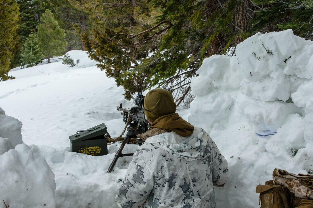 U.S Marine Corps Pfc. Daniel Furgison, machine gunner, 1st Battalion, 6th Marine Regiment, 2nd Marine Division, provides security during Mountain Training Exercise (MTX) 1-19, at Marine Corps Mountain Warfare Training Center, Bridgeport, Calif., March 22, 2019. The purpose of MTX is to prepare Marines for harsh weather conditions while enhancing winter warfare skills in cold weather environments. (U.S. Marine Corps photo by Pfc. Christy Yost)