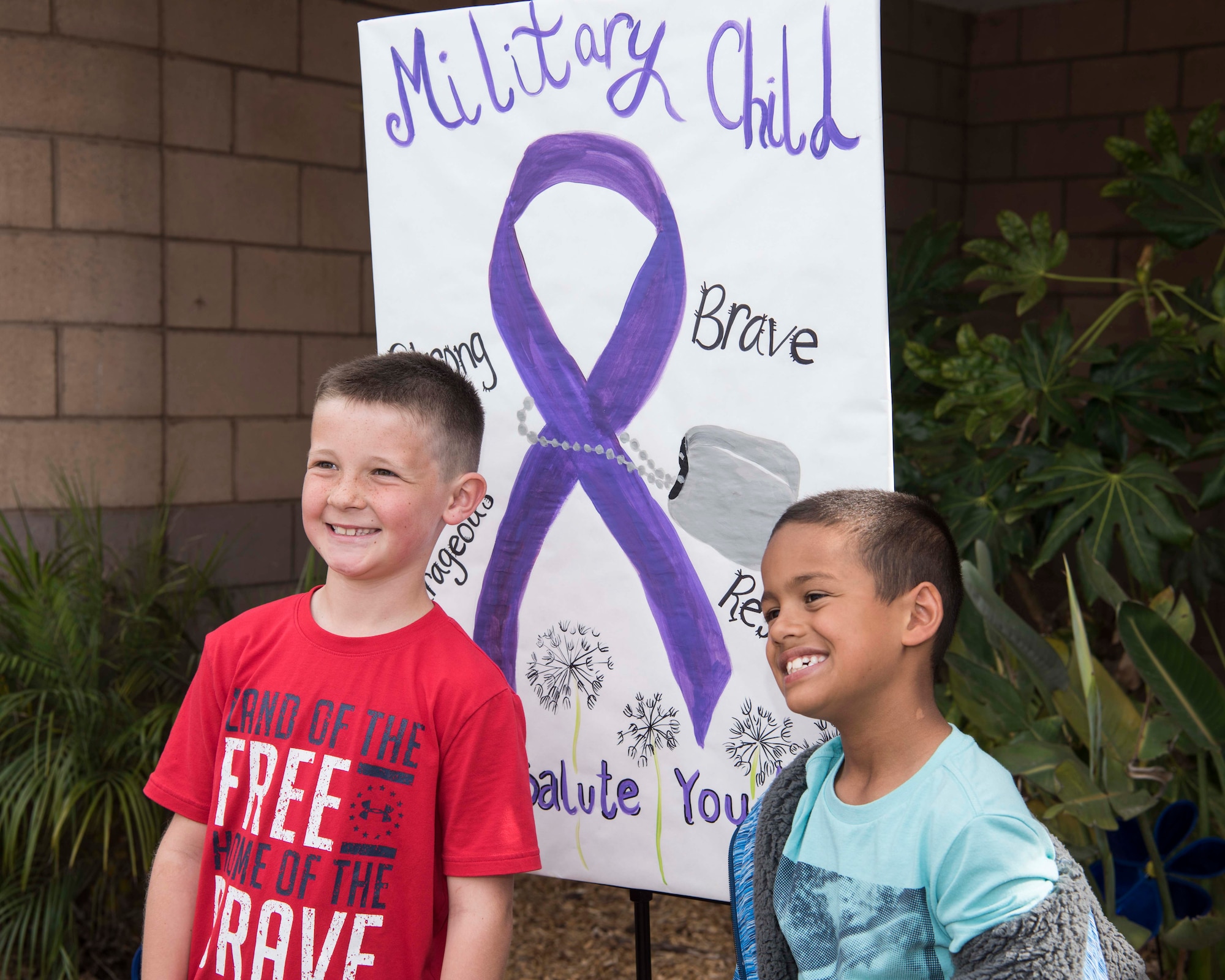 Two children from Vandenberg AFB participate in the Pinwheel for Prevention activity April 1, 2019, at Vandenberg Air Force Base, Calif. As part of Month of the Military Child and Child Abuse Awareness and Prevention Month, Vandenberg AFB will be holding several trainings throughout the month of April dedicated to educating victim advocates, teachers, counselors, and care providers about the risk factors and warning signs of child abuse.