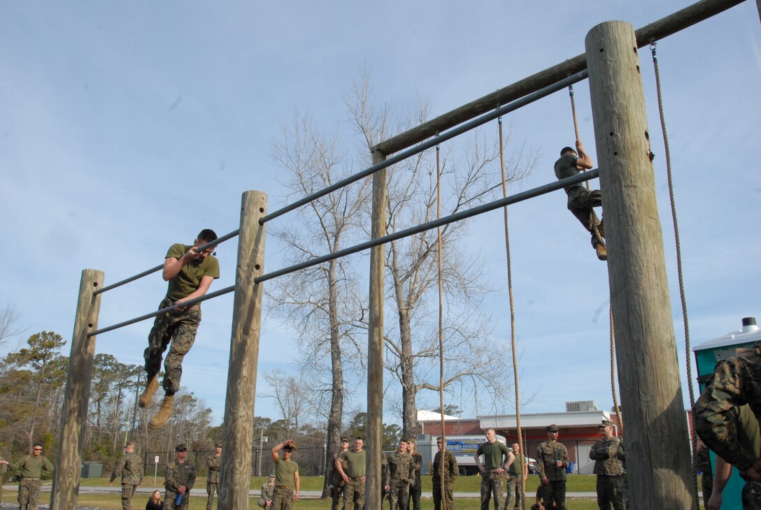 On March 14, 2019 Marine Corps Engineer School (MCES) hosted the annual St. Patrick’s Day Engineer Field Meet to pay homage to St. Patrick, the patron saint for engineers; build camaraderie amongst the engineer and utility communities, and compete for the Engineer Field Meet Trophy. Teams of Marines compete in the Obstacle Course Relay to see who can run all their Marines through the Obstacle Course the fastest.