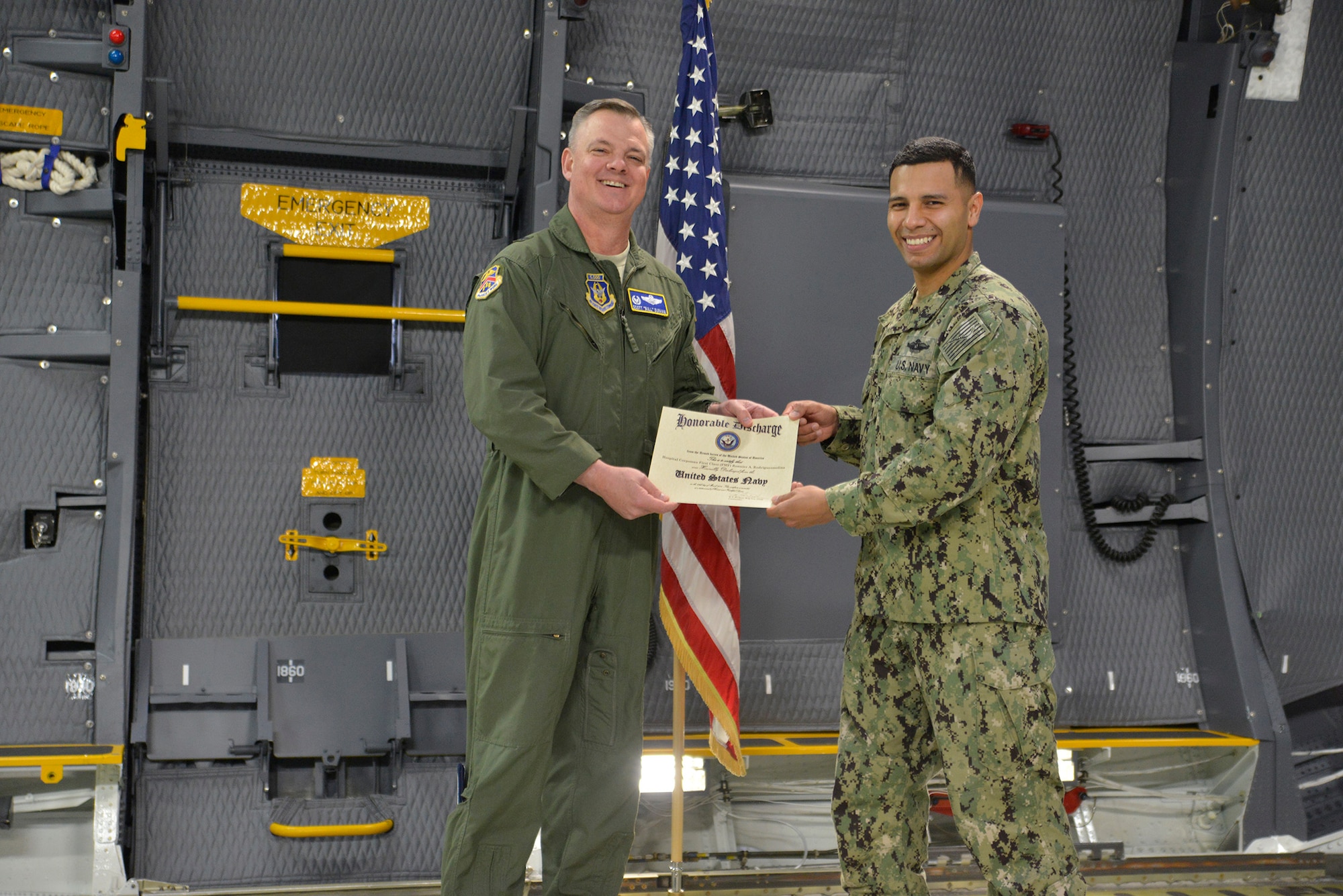 Seaman reenlists aboard a Super Galaxy