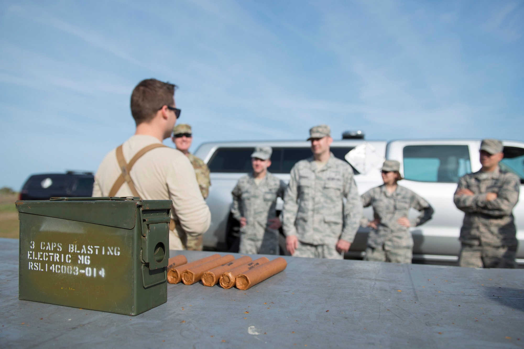 U.S. Air Force Staff Sgt. Evan Weier, an explosive ordnance disposal technician with the 45th Civil Engineer Squadron's EOD flight, gives a safety briefing to members of the Air Force Technical Applications Center prior to detonating explosives at Cape Canaveral Air Force Station, Florida, March 13, 2019.  Weier and his EOD co-workers assisted members of AFTAC's Systems Development Directorate with testing a prototype geodesic dome to help the nuclear treaty monitoring center capture hydroacoustic data. (U.S. Air Force photo by Matthew S. Jurgens)