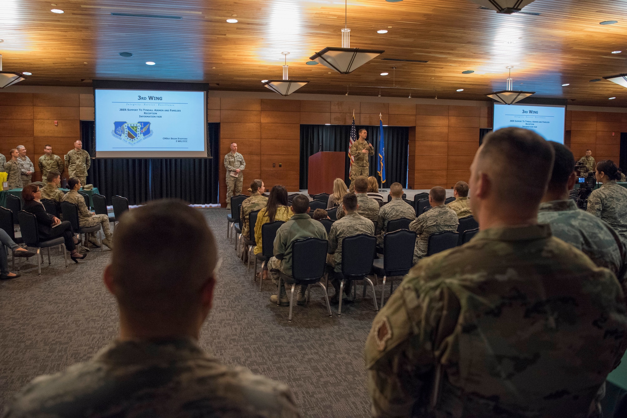 U.S. Air Force Col. Robert D. Davis, 3rd Wing commander, speaks during a welcome reception at Joint Base Elmendorf-Richardson, Alaska, April 8, 2019. The JBER Support to Tyndall Airmen and Families Reception was a one-stop information fair connecting them with the appropriate agencies to address their immediate and specific needs and to learn more about services they offer.