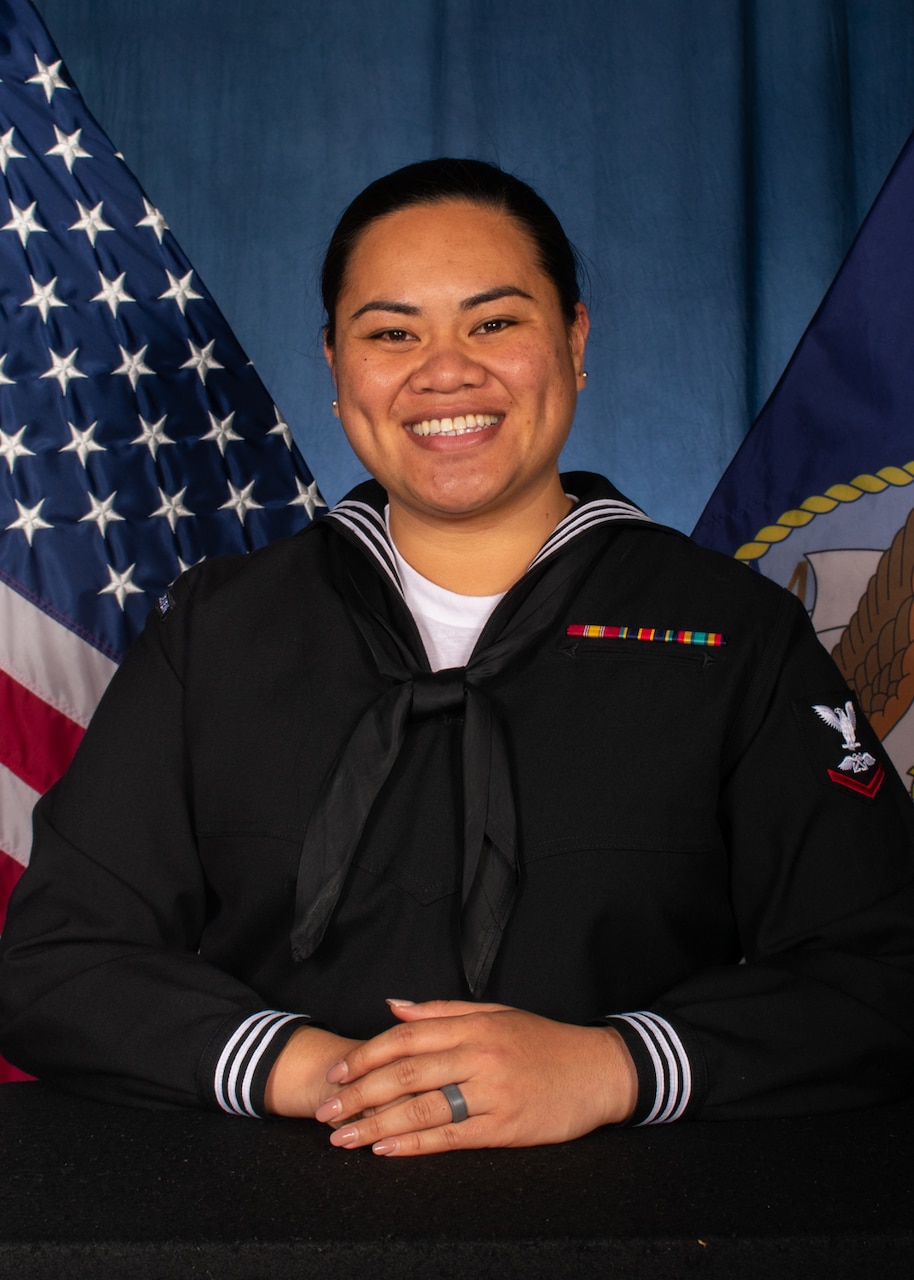 Aviation Boatswain’s Mate (Fuels) Third Class Cynthol F. Fuata, assigned to Naval Beach Unit 7, poses for an official photo.