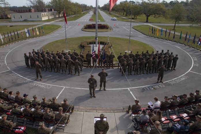 U.S. Sailors with 2nd Marine Logistics Group stand in formation during a change of charge ceremony at Camp Lejeune, N.C., April 4, 2019.  Master Chief Petty Officer Christopher Rebana was relieved by Master Chief Petty Officer Richard A. Jackson as command master chief of 2nd MLG. (U.S. Marine Corps photo by Lance Cpl. Scott Jenkins)