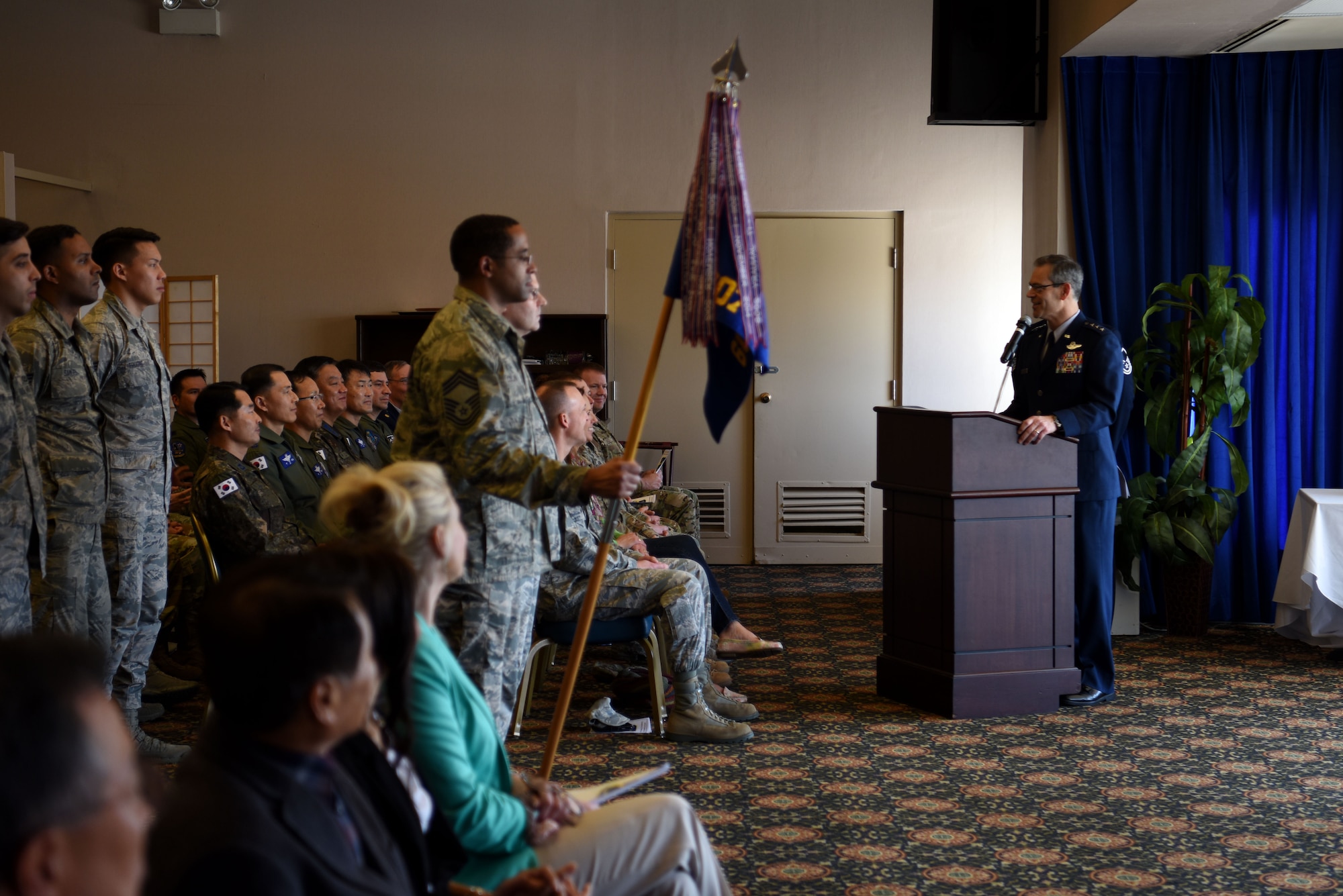 U.S. Air Force Lt. Gen. Kenneth Wilsbach, Seventh Air Force commander, speaks at an assumption of command ceremony for the 607th Air Operations Center at Osan Air Base, Republic of Korea, April 5, 2019. Wilsbach spoke about Col. Christopher Russell, the incoming commander, who has commanded operations centers at Joint Base Pearl Harbor-Hickam, Hawaii and Joint Base San Antonio-Lackland, Texas. (U.S. Air Force photo by Staff Sgt. Kelsey Tucker)