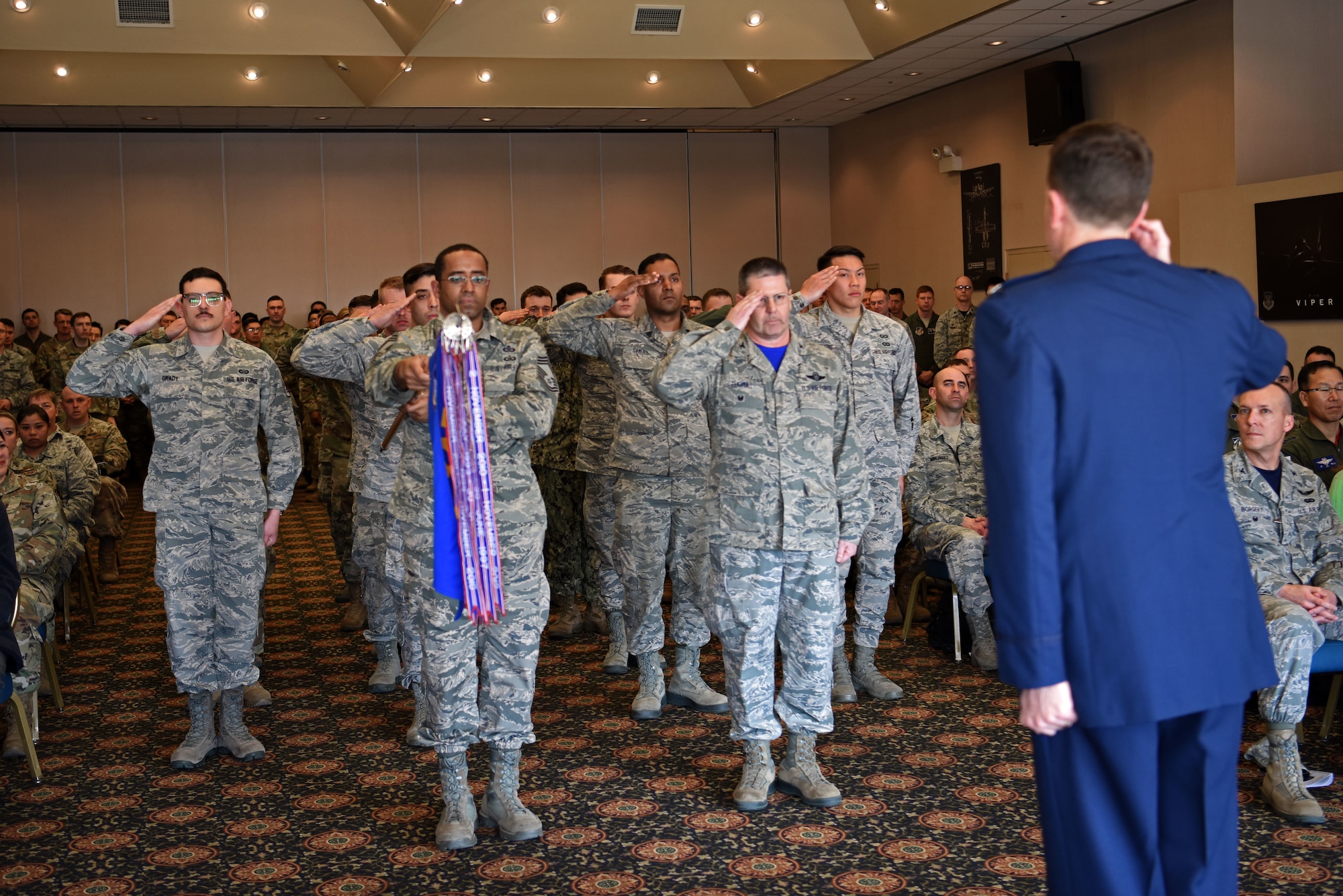 Members of the 607th Air Operations Center render a first salute to their new commander, U.S. Air Force Col. Christopher Russell, during his assumption of command ceremony at Osan Air Base, Republic of Korea, April 5, 2019. Russell assumed commander of the most-forward deployed AOC in the world. The 607th’s mission is to plan, command and control, execute and assess air, space and information operations to meet Secretary of Defense, Pacific Air Force Forces and USFK taskings across the spectrum of military operations. (U.S. Air Force photo by Staff Sgt. Kelsey Tucker)