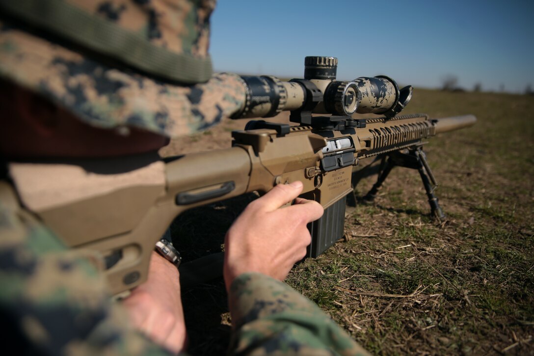 A U.S. Marine with Special Purpose Marine Air-Ground Task Force-Crisis Response-Africa 19.1, Marine Forces Europe and Africa, fires the M110 Semi-Automatic Sniper System during Platinum Eagle 19.1, a multilateral training exercise held at Babadag Training Area, Romania, March 18, 2019.