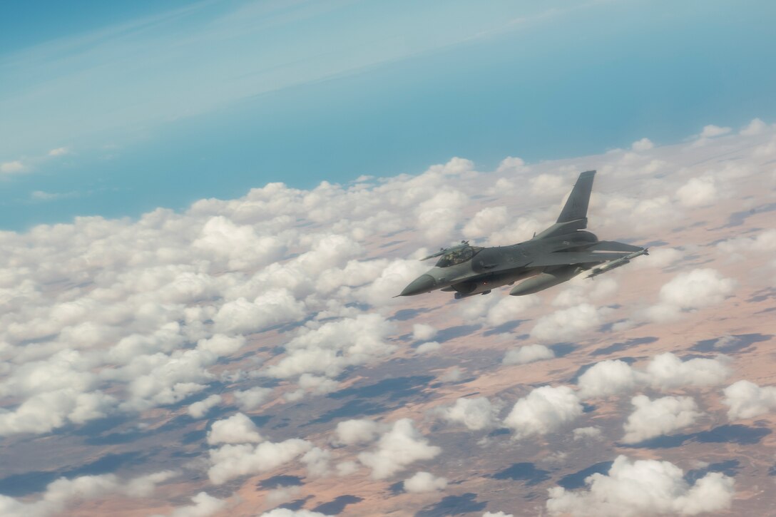 A U.S. Air Force F-16C Fighting Falcon from the 555th Expeditionary Fighter Squadron flies over the skies of Morocco after receiving fuel from a KC-135 Stratotanker from the 100th Air Refueling Wing, RAF Mildenhall, England, during exercise African Lion 2019, April 1, 2019. The exercise held in the Kingdom of Morocco allowed U.S. forces to support Moroccan capabilities development using aviation and aerial refueling training. (U.S. Air Force photo by Staff Sgt. Ceaira Tinsley)