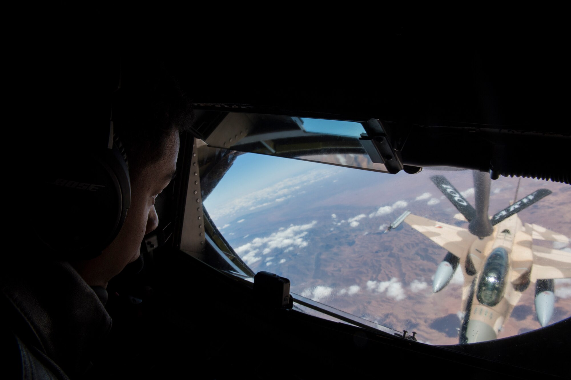 U.S. Air Force Senior Airman Justin Pauleon, a 351st Air Refueling Squadron boom operator, conducts an air-refueling mission during exercise African Lion 2019 over the skies of Morocco, April 1, 2019. The exercise was designed to strengthen U.S. relationships with regional partners which is key to shaping the future security environment. African Lion 2019 is an annual, combined multilateral exercises designed to improve interoperability and mutual understanding of each nation’s tactics, techniques and procedures while demonstrating a strong partnership between nation’s militaries. (U.S. Air Force photo by Staff Sgt. Ceaira Tinsley)