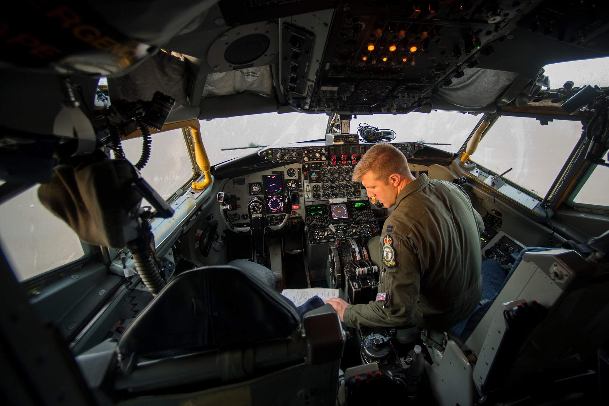 U.S. Air Force Capt. Brian Klazura, a 351st Air Refueling Squadron KC-135 Stratotanker pilot, reviews a pre-flight checklist during exercise African Lion 2019, April 2, 2019, at Moron Air Base, Spain. The crew supported U.S. and Royal Moroccan Air Force refueling training, which promoted interoperability and further developed tactics, techniques, and procedures of participating nations to counter-violent extremist organizations. (U.S. Air Force photo by Staff Sgt. Ceaira Tinsley)