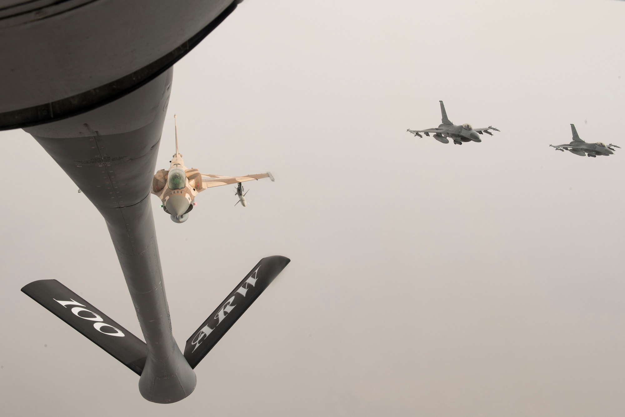 A Royal Moroccan Air Force F-16 prepares to receive fuel from a U.S. Air Force KC-135 Stratotanker from the 100th Air Refueling Wing, RAF Mildenhall, England, during exercise African Lion 2019 over the skies of Morocco, April 2, 2019. African Lion 2019 is an annual, combined multilateral exercises designed to improve interoperability and mutual understanding of each nation’s tactics, techniques and procedures while demonstrating a strong partnership between nation’s militaries. (U.S. Air Force photo by Staff Sgt. Ceaira Tinsley)