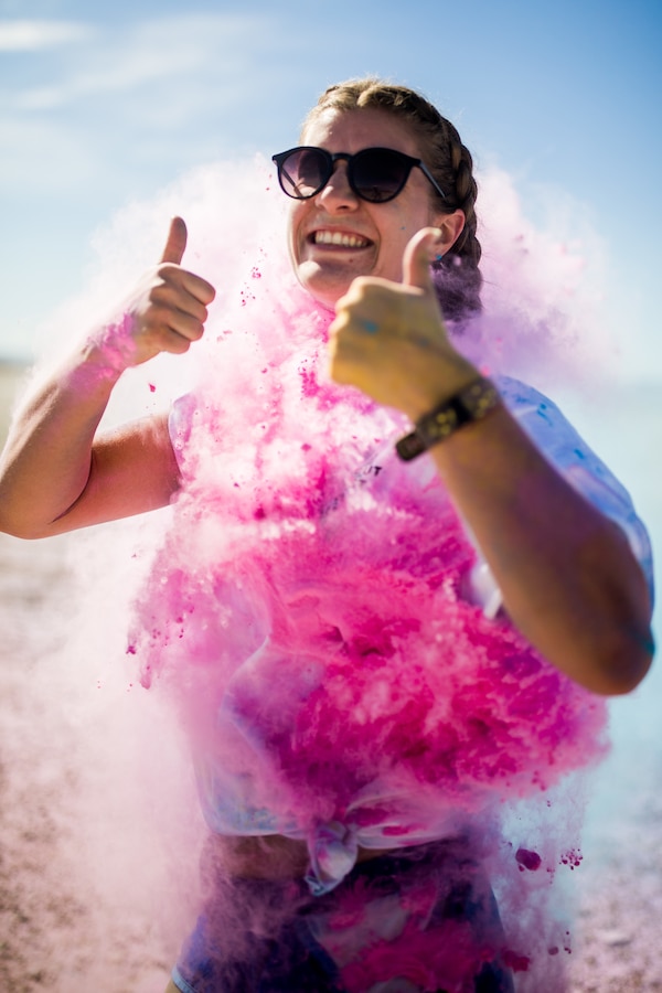 A Participant takes part in the fifth annual Colorful Consent Run on Marine Corps Air Ground Combat Center, Twentynine Palms, Calif,. April 5th, 2019. The 3.2 mile (5 kilometer) run took place in April, Sexual Assault Awareness Month. (U.S. Marine Corps photograph by Pfc. Cedar Barnes)