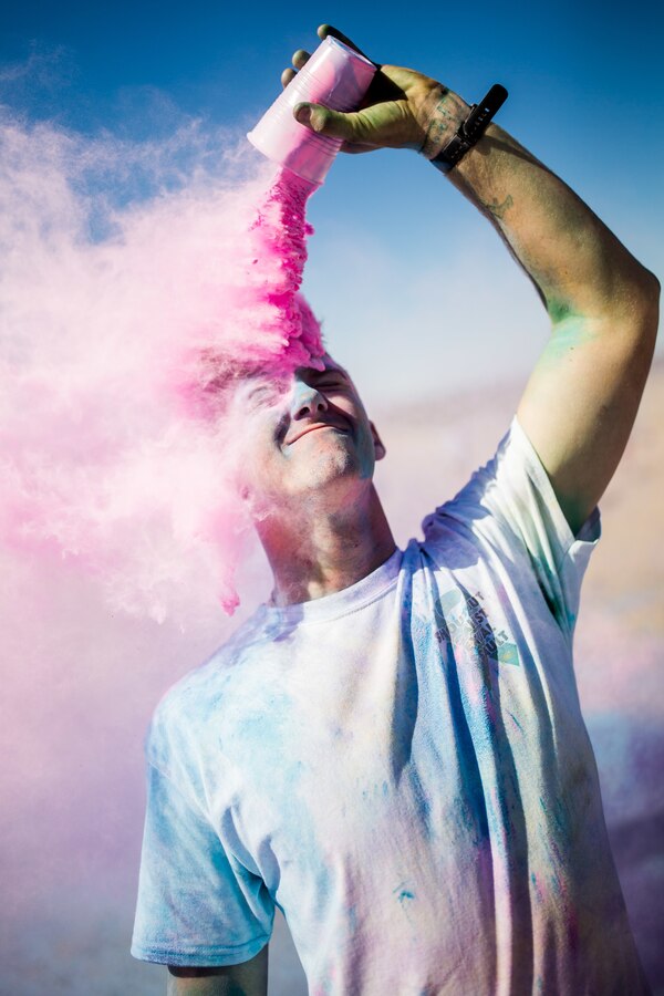 A Participant takes part in the fifth annual Colorful Consent Run on Marine Corps Air Ground Combat Center, Twentynine Palms, Calif,. April 5th, 2019. The 3.2 mile (5 kilometer) run took place in April, Sexual Assault Awareness Month. (U.S. Marine Corps photograph by Pfc. Cedar Barnes)