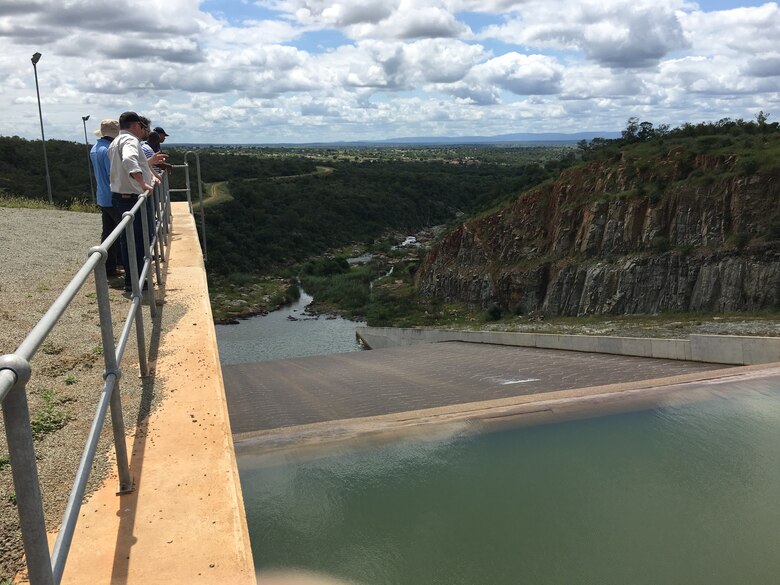 Steve England and Jake Helminiak of the USACE Philadelphia District traveled to the Kingdom of Eswatini (formerly Swaziland) to participate in workshops, field visits, and to share their expertise with government officials. During the visit, the group met with hydrologists and field technicians from the Department of Water Affairs. They visited multiple dams, gaging stations, and a local agricultural water impoundment.