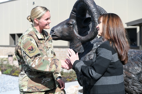 Captain Christina Merritt, 34th Air Maintenance Unit, meets retired Lt. Gen. Terry Gabreski during a visit to the 388th Maintenance Group at Hill Air Force Base, Utah. Merritt is the first woman to lead an operational F-35A maintenance unit, and during her Air Force career, Gabreski was the first woman to lead an operational F-16 AMU, which also stood up at Hill. (U.S. Air Force Photo by Cynthia Griggs)