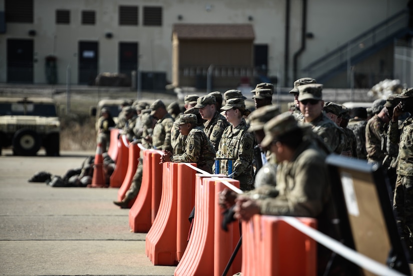 U.S. Army soldiers assigned to the 7th Transportation Brigade (Expeditionary), observe and cheer on their battalion team competing for the brigade title at Joint Expeditionary Base Little Creek-Fort Story, Virginia, March 29, 2019. The 368th Inland Cargo Transportation Company, 11th Trans. Battalion created the concept last year, and it expanded brigade wide for the 2019 competition. (U.S. Army photo by Spc. Travis Teate)