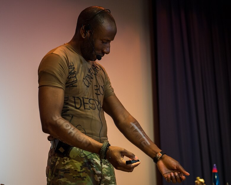 U.S. Air Force Staff Sgt. Patrick Sims, 733rd Logistics Readiness Squadron vehicle mechanic, marks off the negative emotions written on his arms while rehearsing the play ‘Everybody Knows’ at Joint Base Langley-Eustis, Virginia, April 9, 2019.