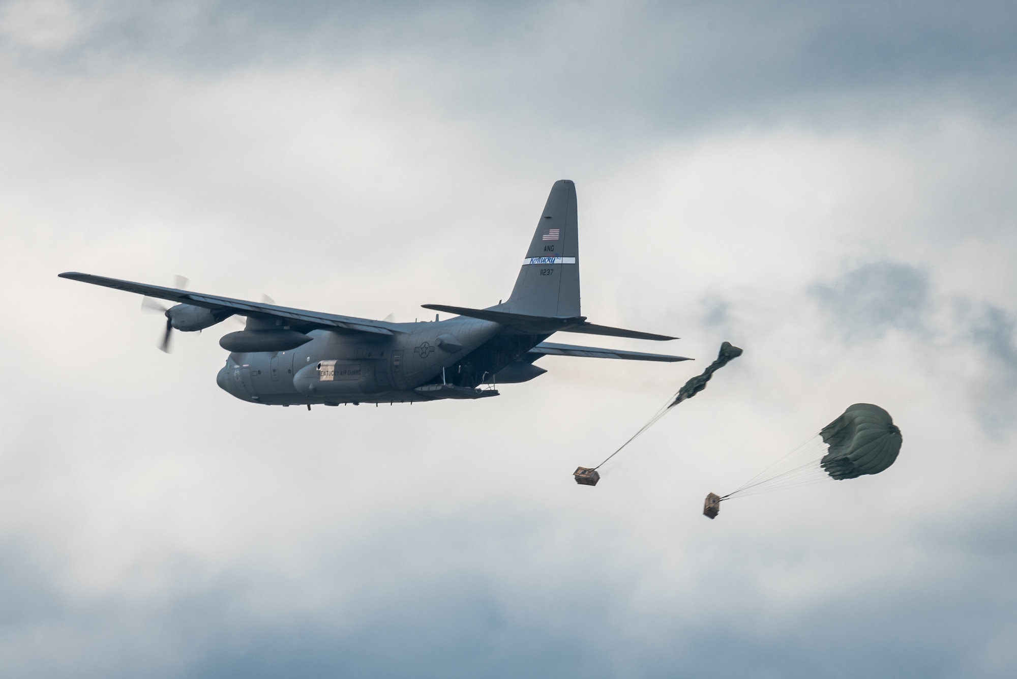 A C-130 Hercules aircraft from the Kentucky Air National Guard’s 123rd Airlift Wing air-drops two bundles of cargo in the Ohio River during the Thunder Over Louisville air show in Louisville, Ky., April 22, 2017. The unit will perform a similar demonstration during this year's Thunder, which annual has grown to become the largest single-day air show in the nation. (U.S. Air National Guard photo by Lt. Col. Dale Greer)