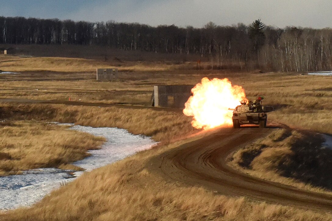 Army tank crews engage targets.