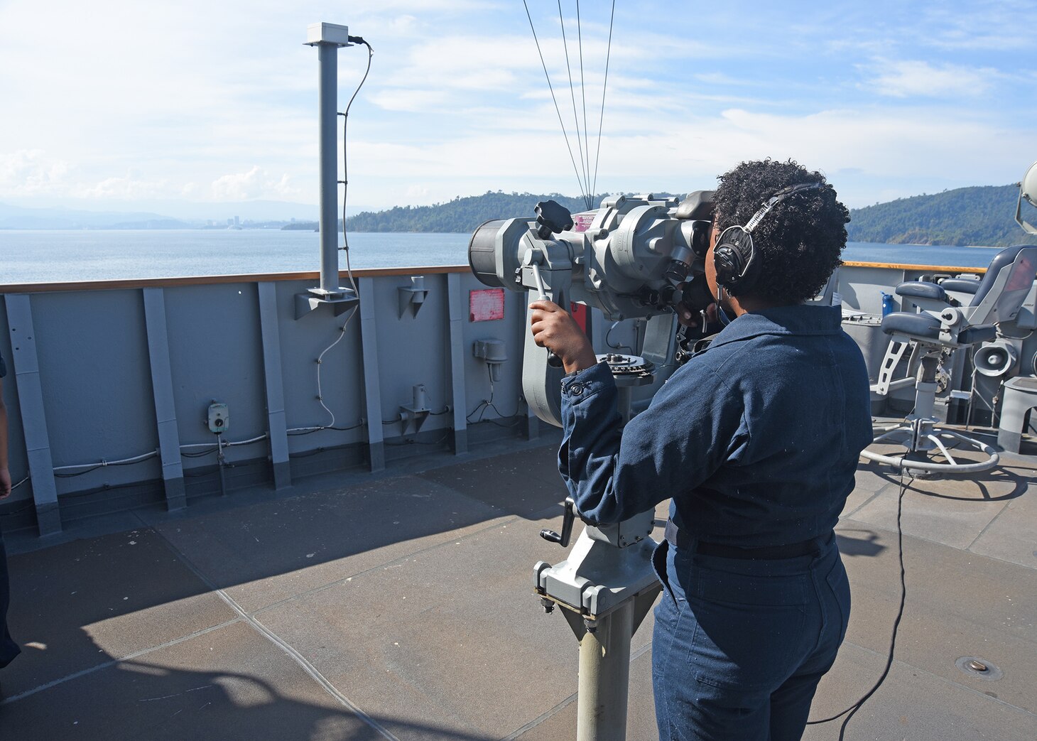 KOTA KINABALU, Malaysia (April 11, 2019) - Operations Specialist Seaman Apprentice Jasmine Dixon, from Chicago, performs her duties as a lookout aboard U.S. 7th Fleet flagship USS Blue Ridge (LCC 19) as the ship arrives for a port visit to Kota Kinabalu, Malaysia. Blue Ridge is the oldest operational ship in the Navy, and as 7th Fleet command ship, is responsible for fostering relationships within the Indo-Pacific Region.