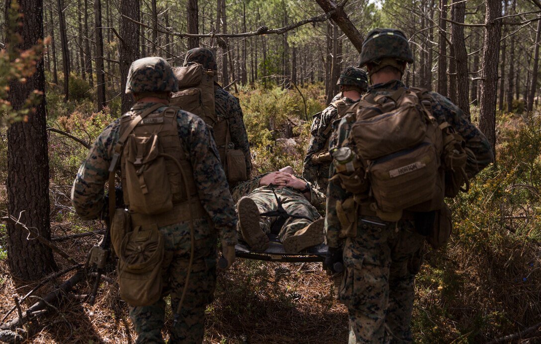 U.S. Marines with Special Purpose Marine Air-Ground Task Force-Crisis Response-Africa 19.2, Marine Forces Europe and Africa, post security during a Tactical Recovery of Aircraft and Personnel exercise in Troia, Portugal, April 5, 2019. SPMAGTF-CR-AF is deployed to conduct crisis-response and theater-security operations in Africa and promote regional stability by conducting military-to-military training exercises throughout Europe and Africa. (U.S. Marine Corps photo by Cpl. Margaret Gale)