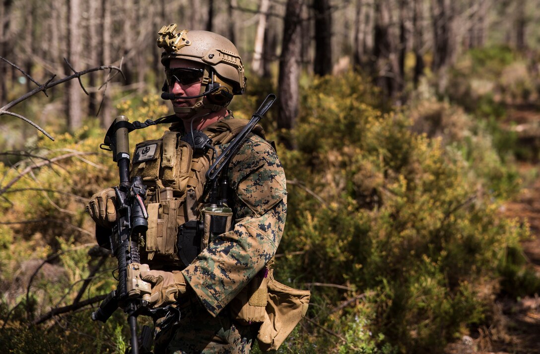 A U.S. Marine with Special Purpose Marine Air-Ground Task Force-Crisis Response-Africa 19.2, Marine Forces Europe and Africa, posts security during a Tactical Recovery of Aircraft and Personnel exercise in Troia, Portugal, April 5, 2019. SPMAGTF-CR-AF is deployed to conduct crisis-response and theater-security operations in Africa and promote regional stability by conducting military-to-military training exercises throughout Europe and Africa. (U.S. Marine Corps photo by Cpl. Margaret Gale)