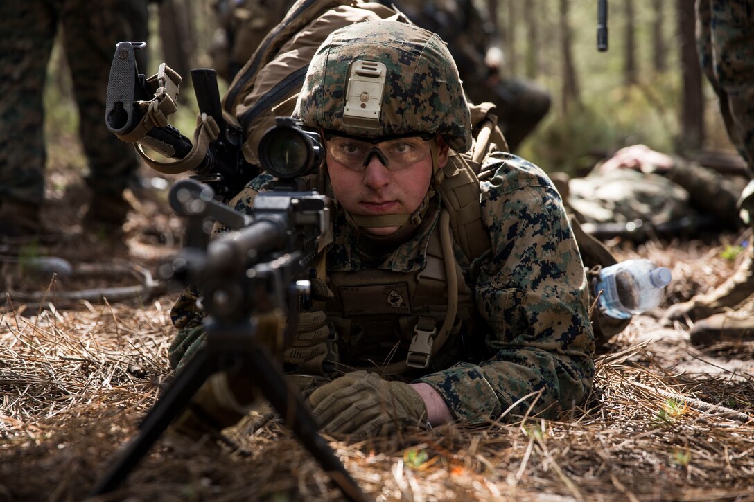A U.S. Marine with Special Purpose Marine Air-Ground Task Force-Crisis Response-Africa 19.2, Marine Forces Europe and Africa, posts security during a Tactical Recovery of Aircraft and Personnel training exercise in Troia, Portugal, April 5, 2019. SPMAGTF-CR-AF is deployed to conduct crisis-response and theater-security operations in Africa and promote regional stability by conducting military-to-military training exercises throughout Europe and Africa. (U.S. Marine Corps photo by Cpl. Margaret Gale)